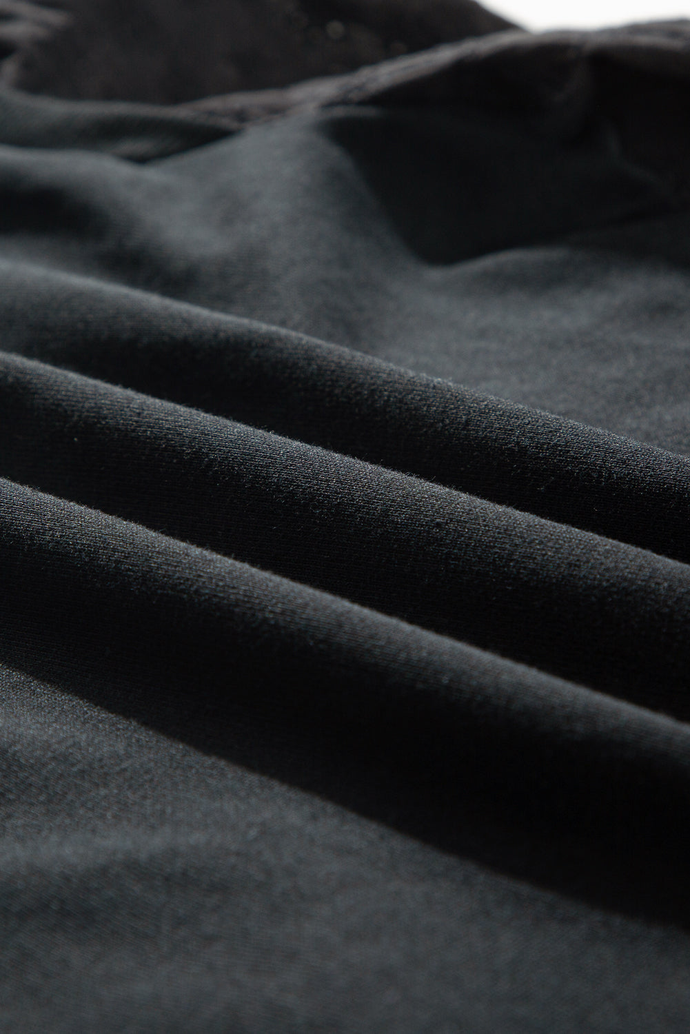 Zwart getextureerd sweatshirt met ronde hals en patchwork