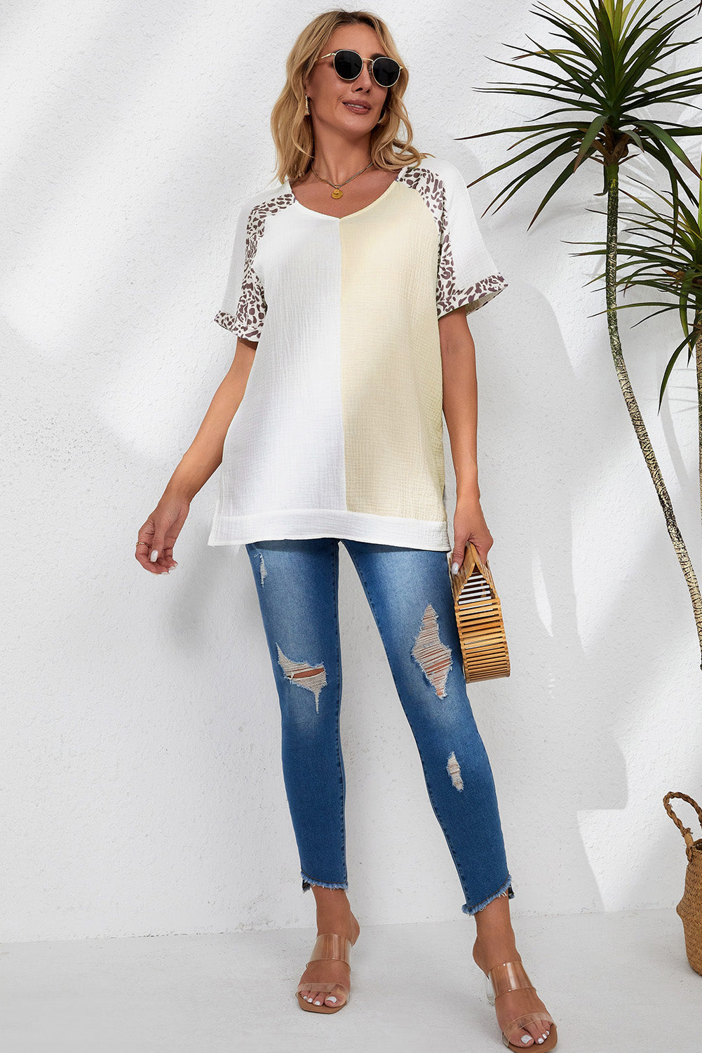 Witte, noodlijdende kleur patchwork blouse met luipaardversiering