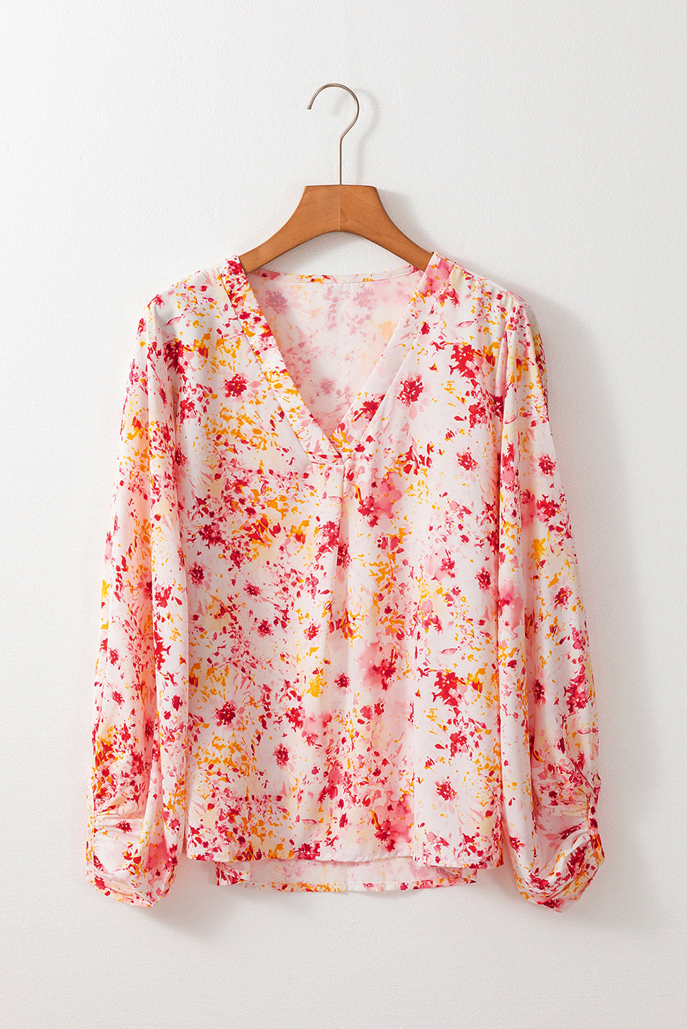 Roze, met bloemen bedrukte blouse met V-hals en bubbelmouwen