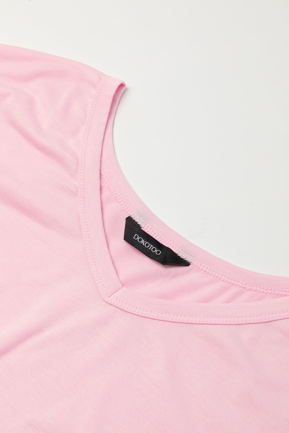 Roze maxi-T-shirtjurk met V-hals en verborgen zaksplitten