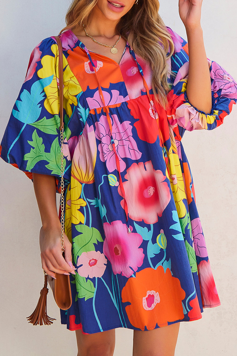 Donkerblauwe bloemenprint split nek babydoll jurk