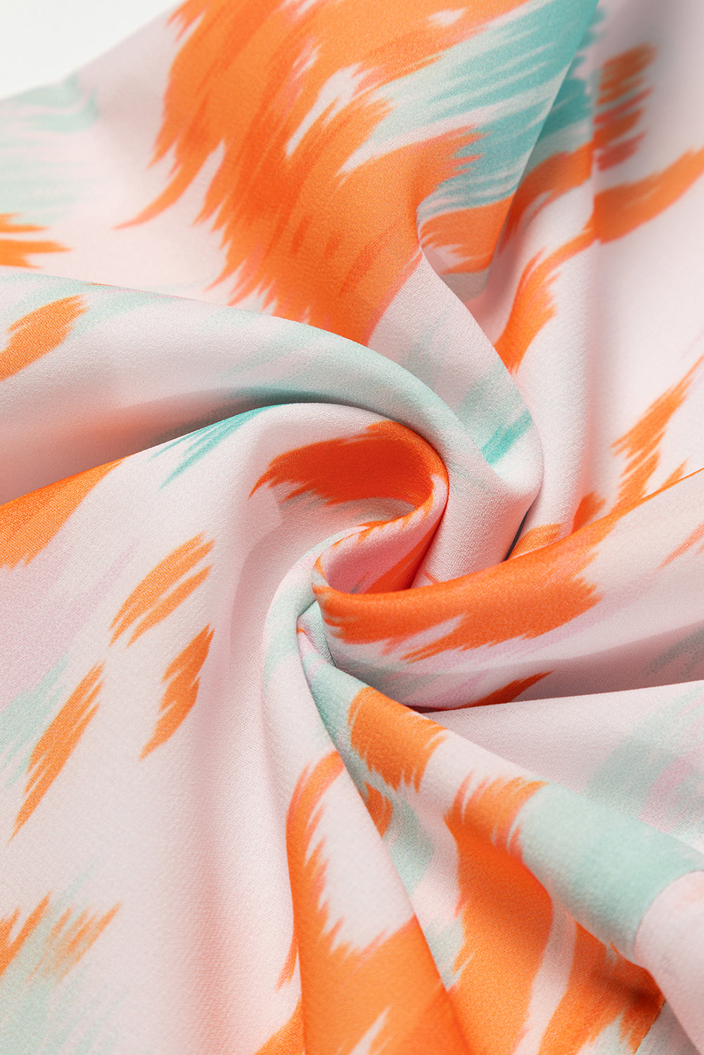 Blouse met veelkleurige abstracte print en splithals en pofmouwen