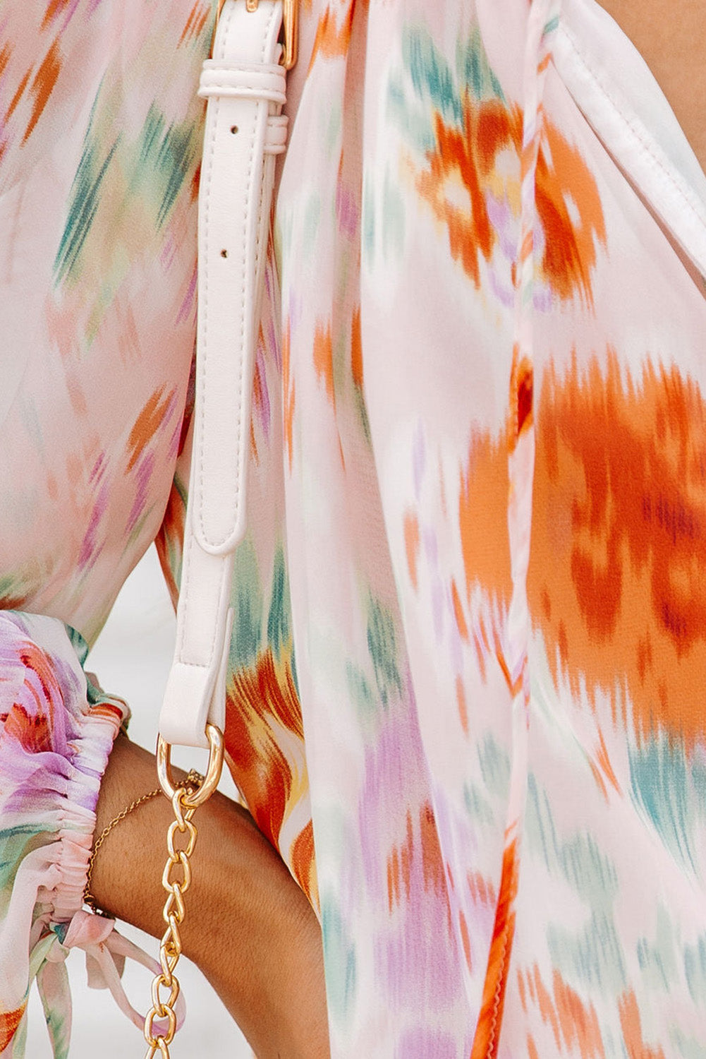 Blouse met veelkleurige abstracte print en splithals en pofmouwen