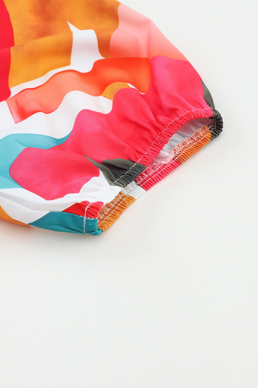 Veelkleurige blouse met vierkante hals en abstracte print en korte mouwen