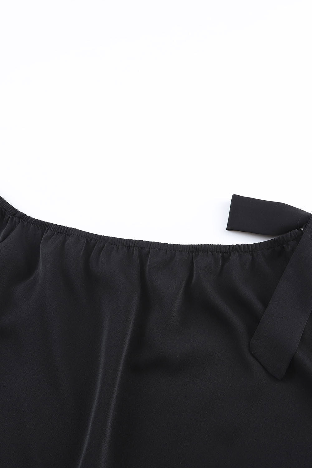 Zwart geknoopte asymmetrische off-shoulder blouse