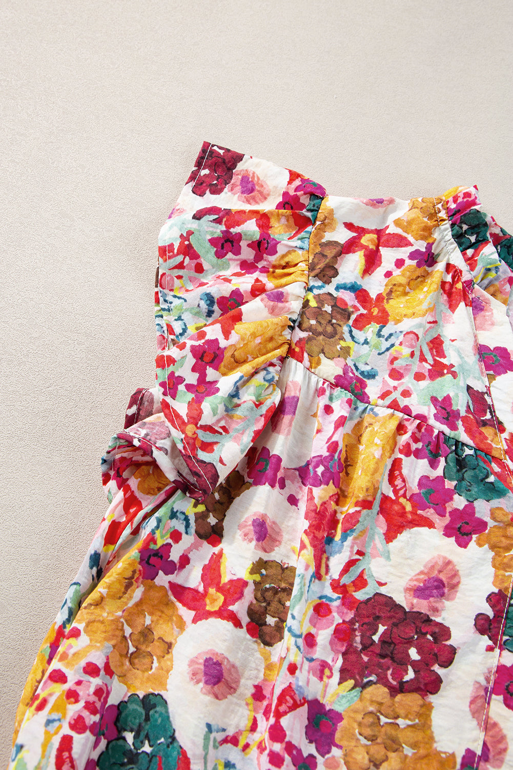 Paarse bloemenprint jurk met splitnek en fladdermouwen
