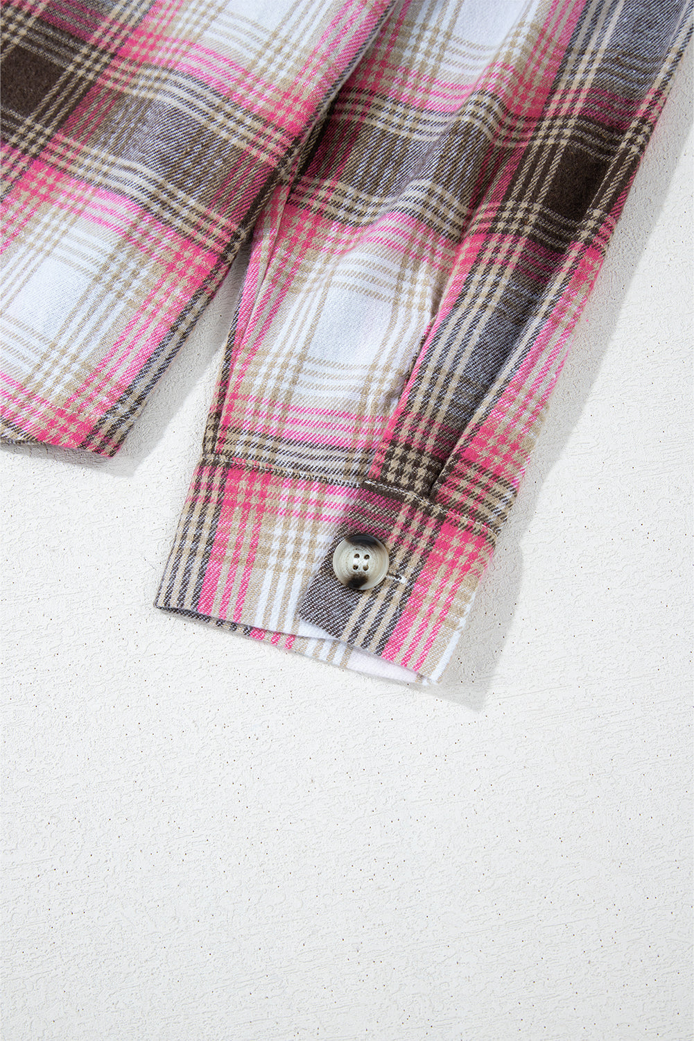 Roze geruite klepzak met knoopsluiting