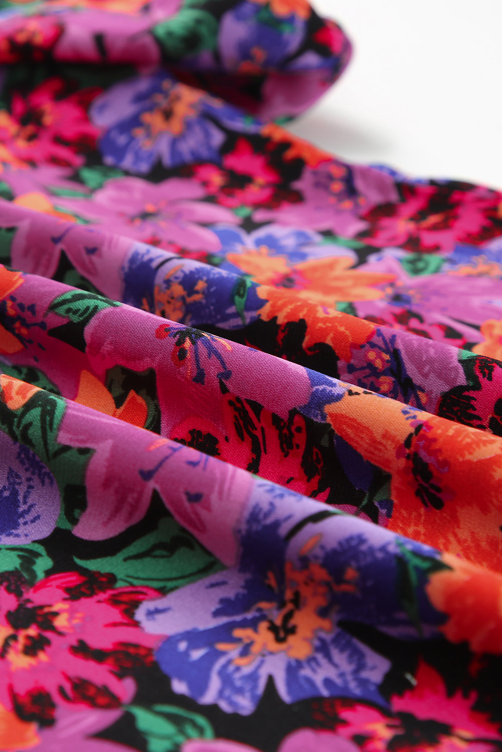Blouse met veelkleurige bloemenprint en ronde hals en pofmouwen