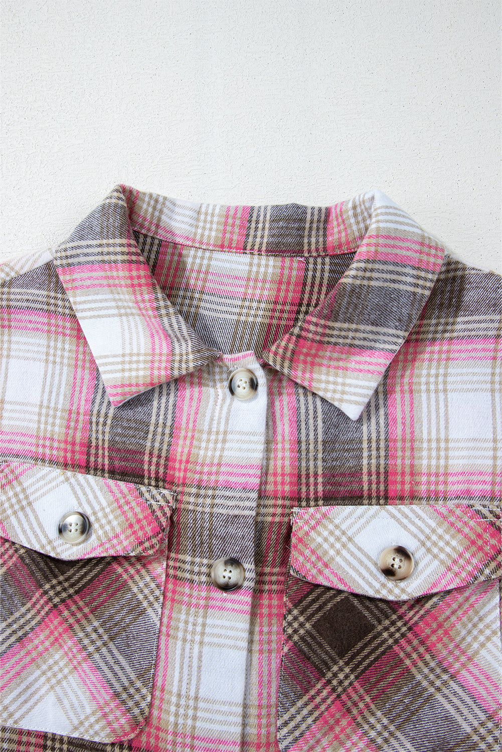 Roze geruite klepzak met knoopsluiting