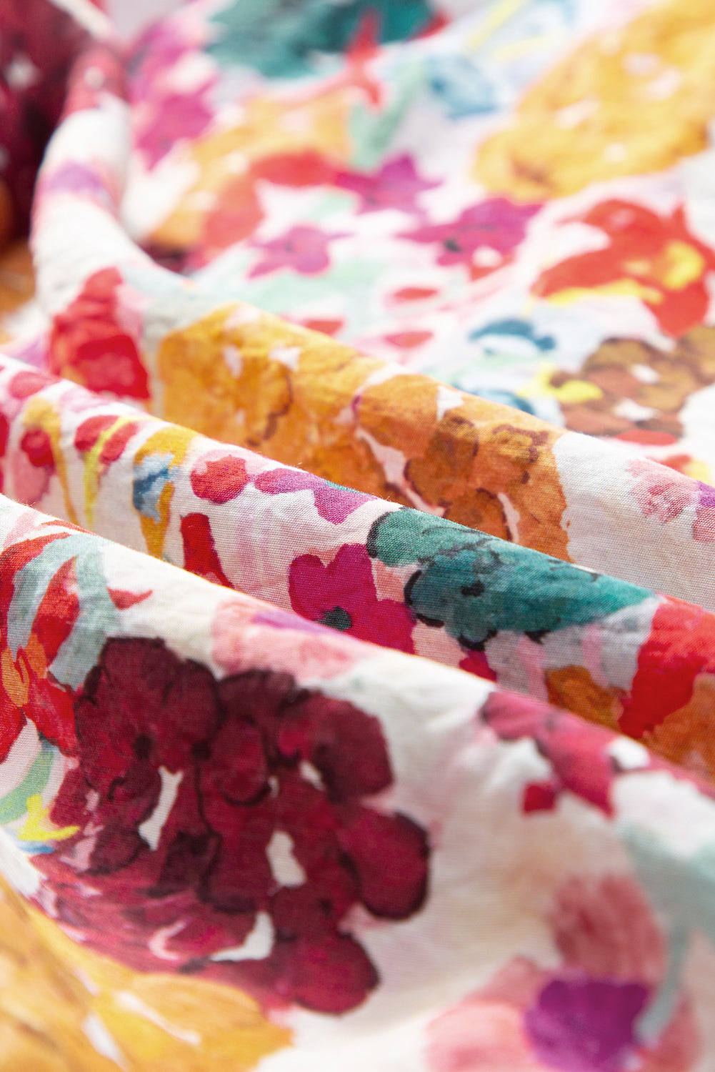 Paarse bloemenprint jurk met splitnek en fladdermouwen