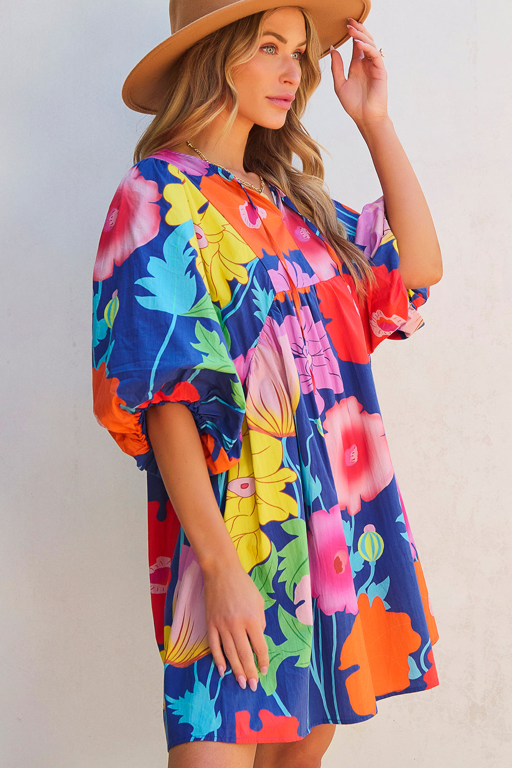 Donkerblauwe bloemenprint split nek babydoll jurk