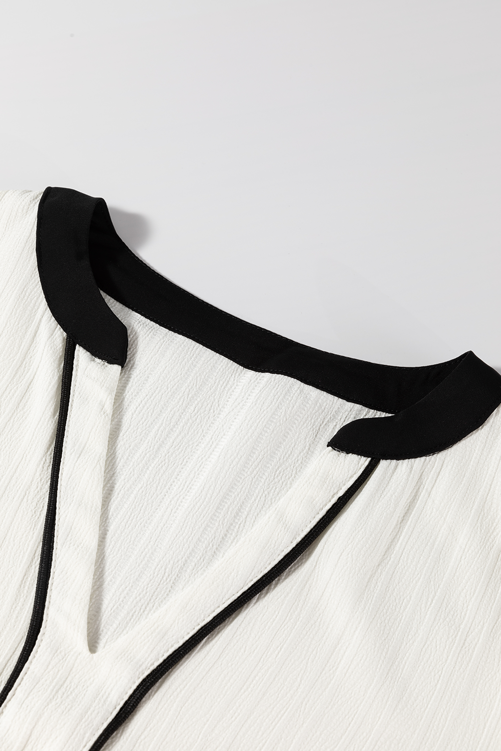 Witte textuur kleurblock v nek elegante blouse