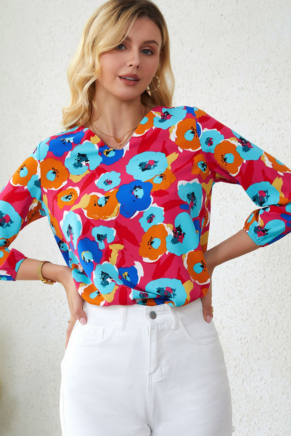 Roze veelkleurige blouse met V-hals en 3/4 mouwen met bloemenprint