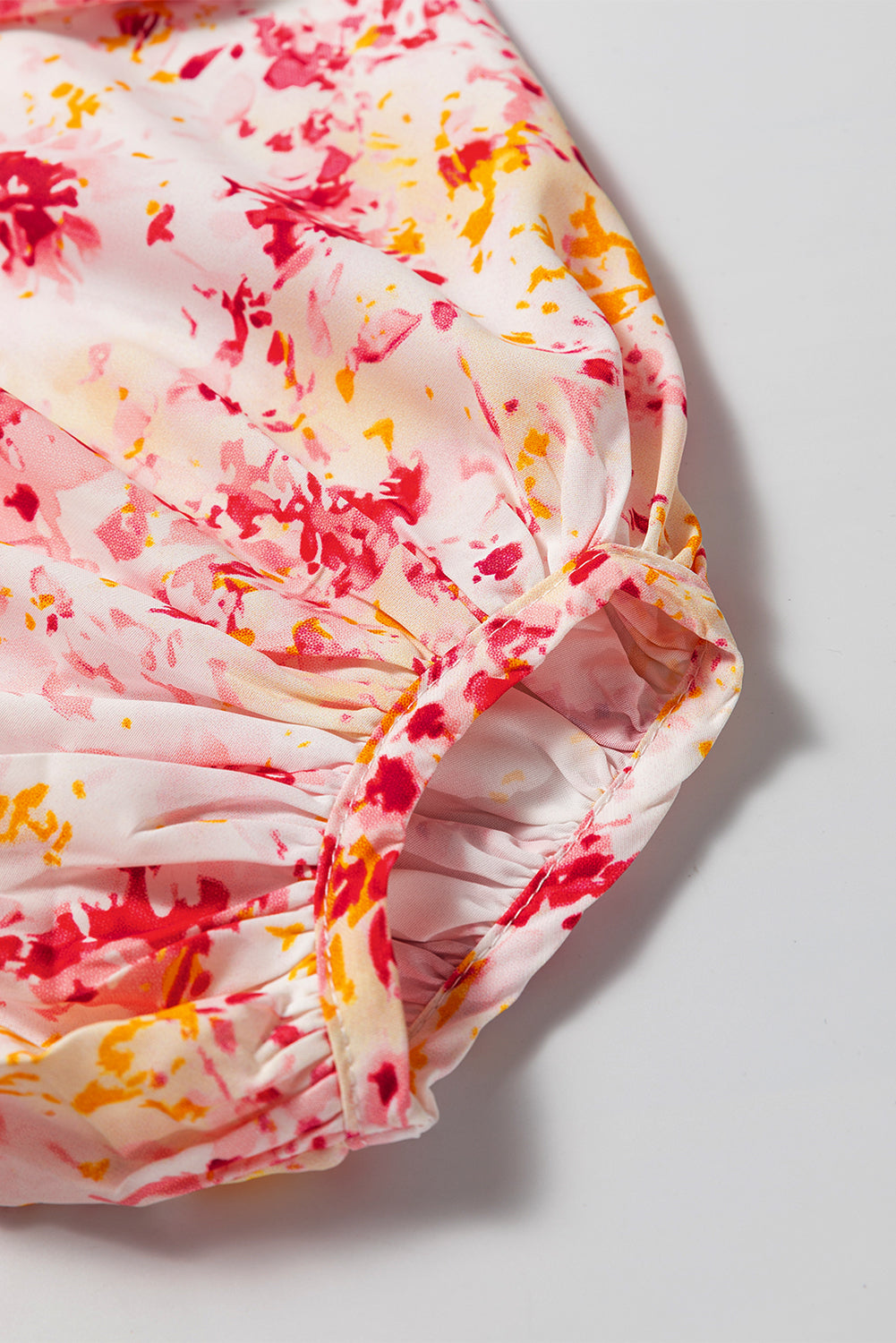 Roze, met bloemen bedrukte blouse met V-hals en bubbelmouwen