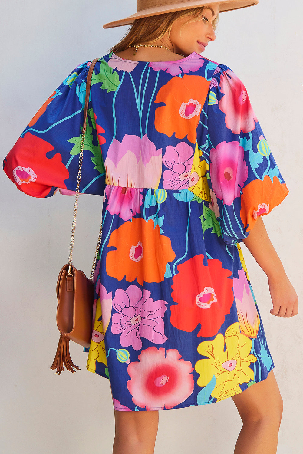 Donkerblauwe bloemenprint split nek babydoll jurk