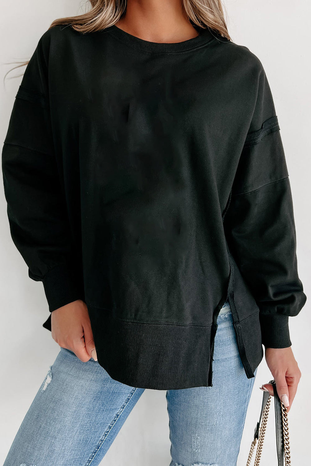 Licht Frans beige blootgestelde naad drop schouder ronde nek sweatshirt met spleten