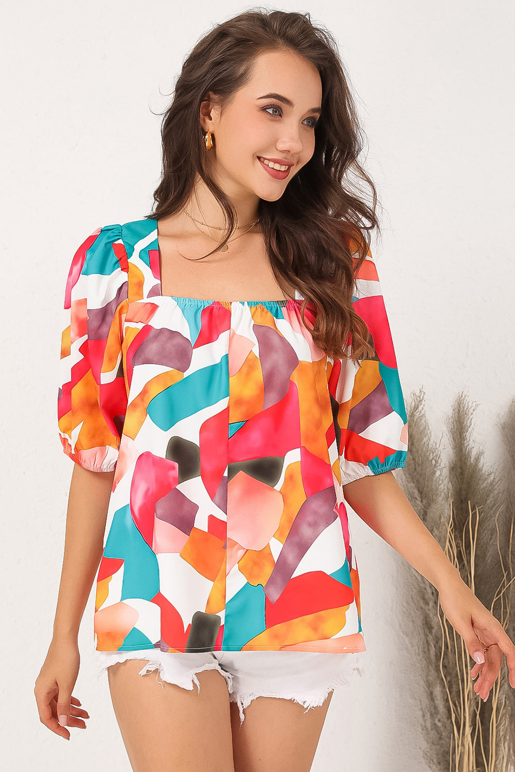 Veelkleurige blouse met vierkante hals en abstracte print en korte mouwen