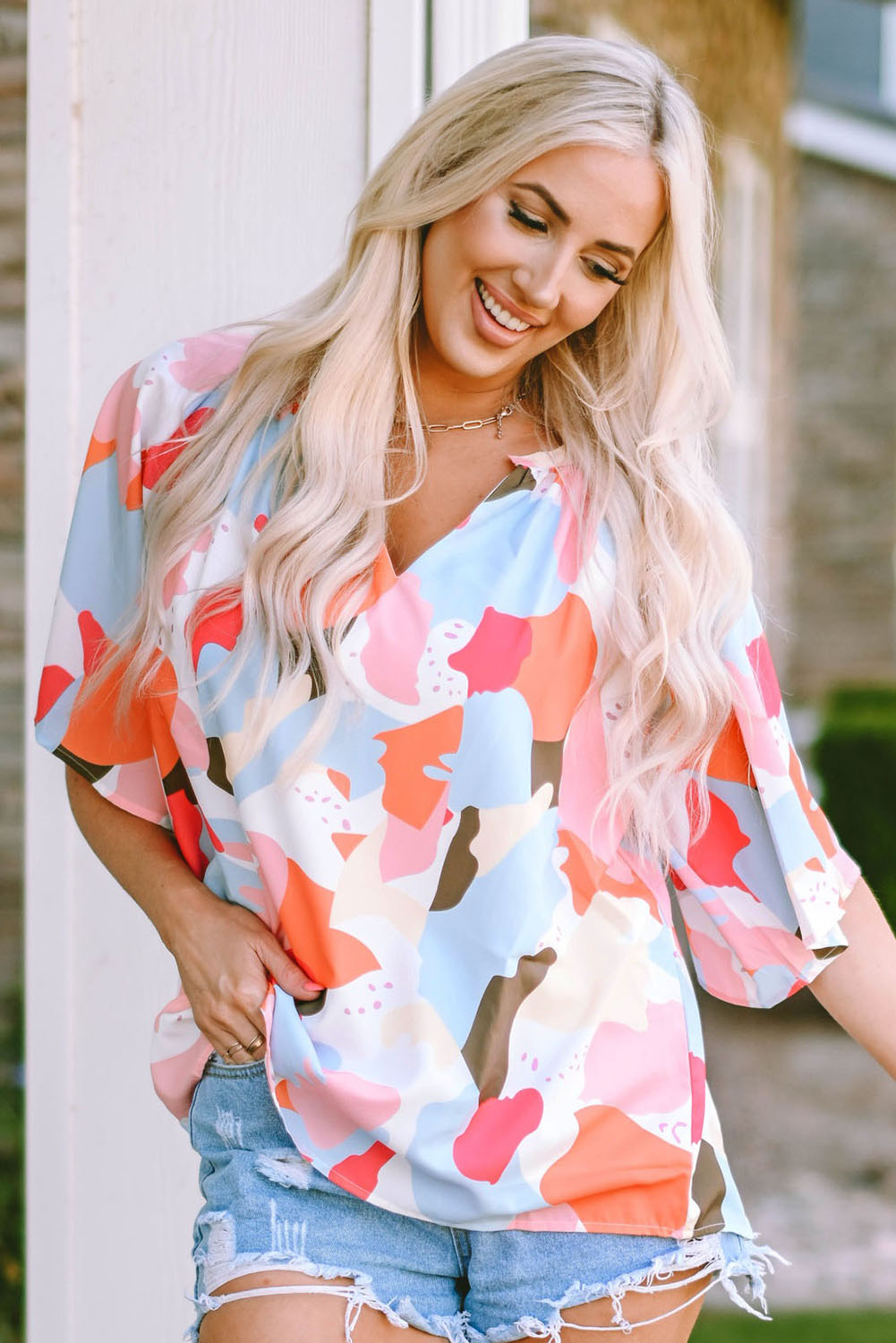 Blouse met veelkleurige bloemenprint, V-hals en halve mouw
