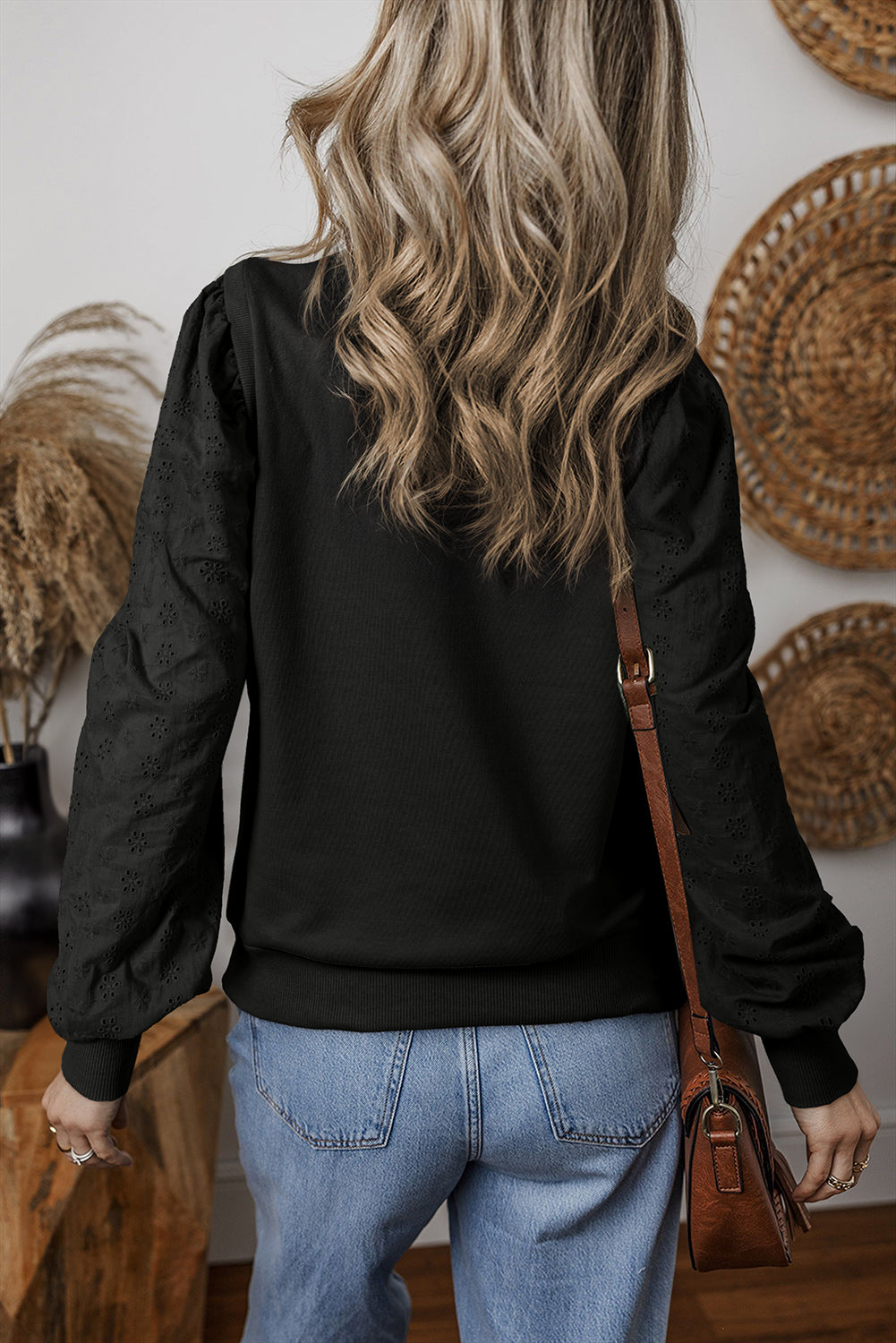 Zwart getextureerd sweatshirt met ronde hals en patchwork