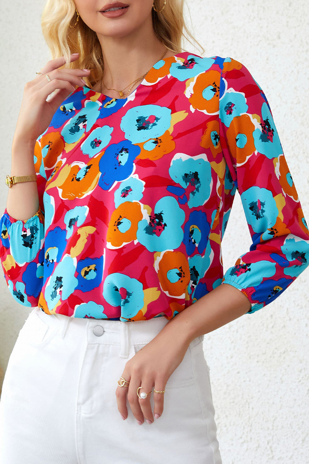 Roze veelkleurige blouse met V-hals en 3/4 mouwen met bloemenprint