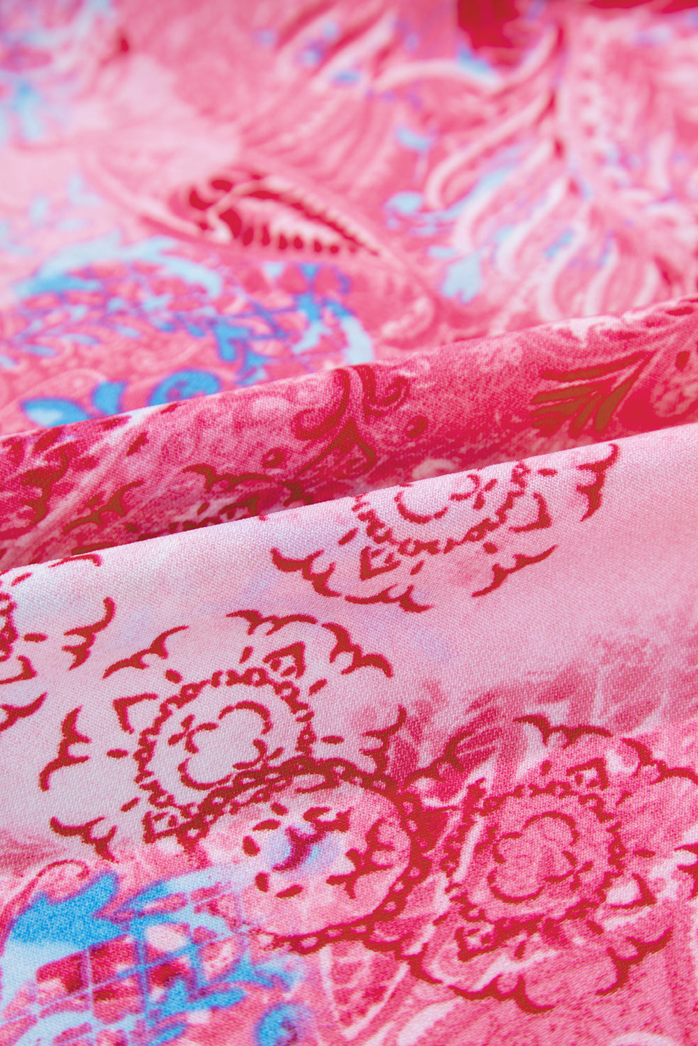 Roze abstracte bloemenprint Notch V-hals opgerolde blouse met korte mouwen