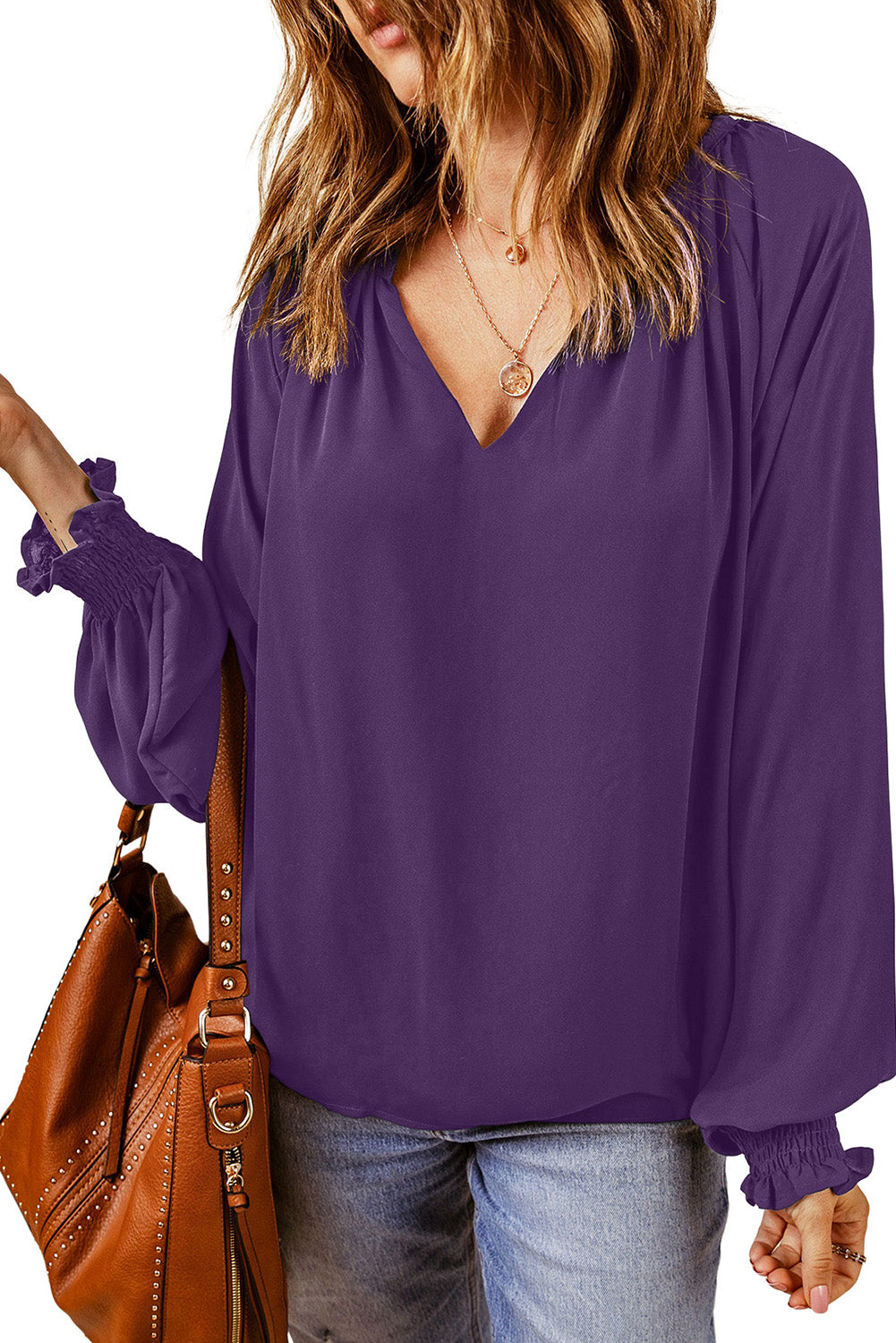 Paarse geplooide blouse met V-hals en gezwollen mouwen