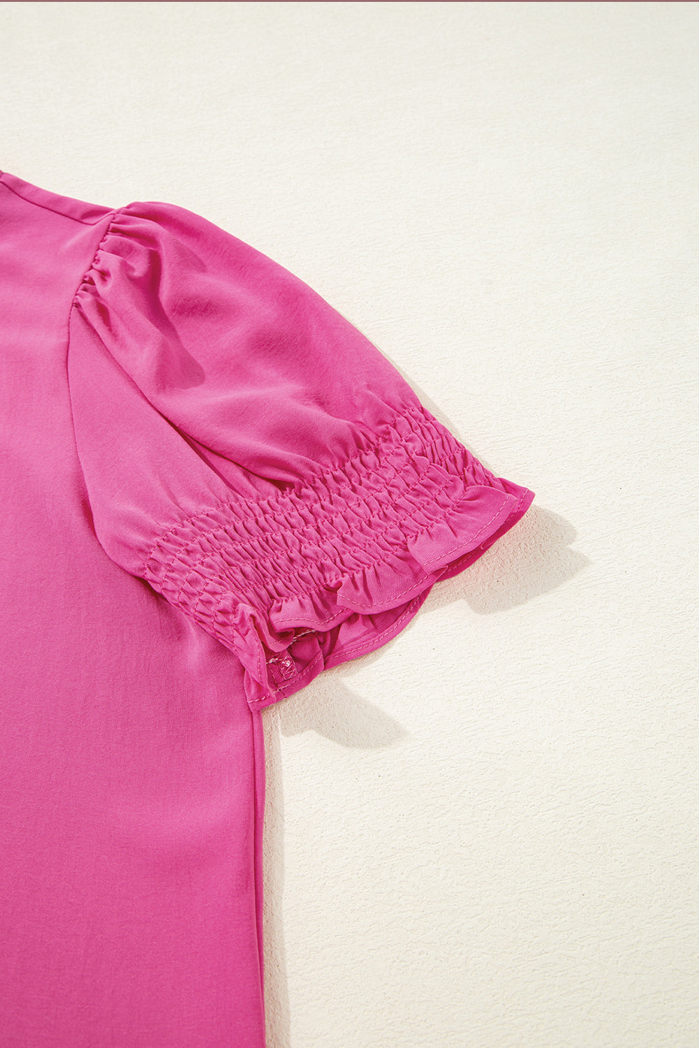 Rose effen kleur gesmokte blouse met pofmouwen
