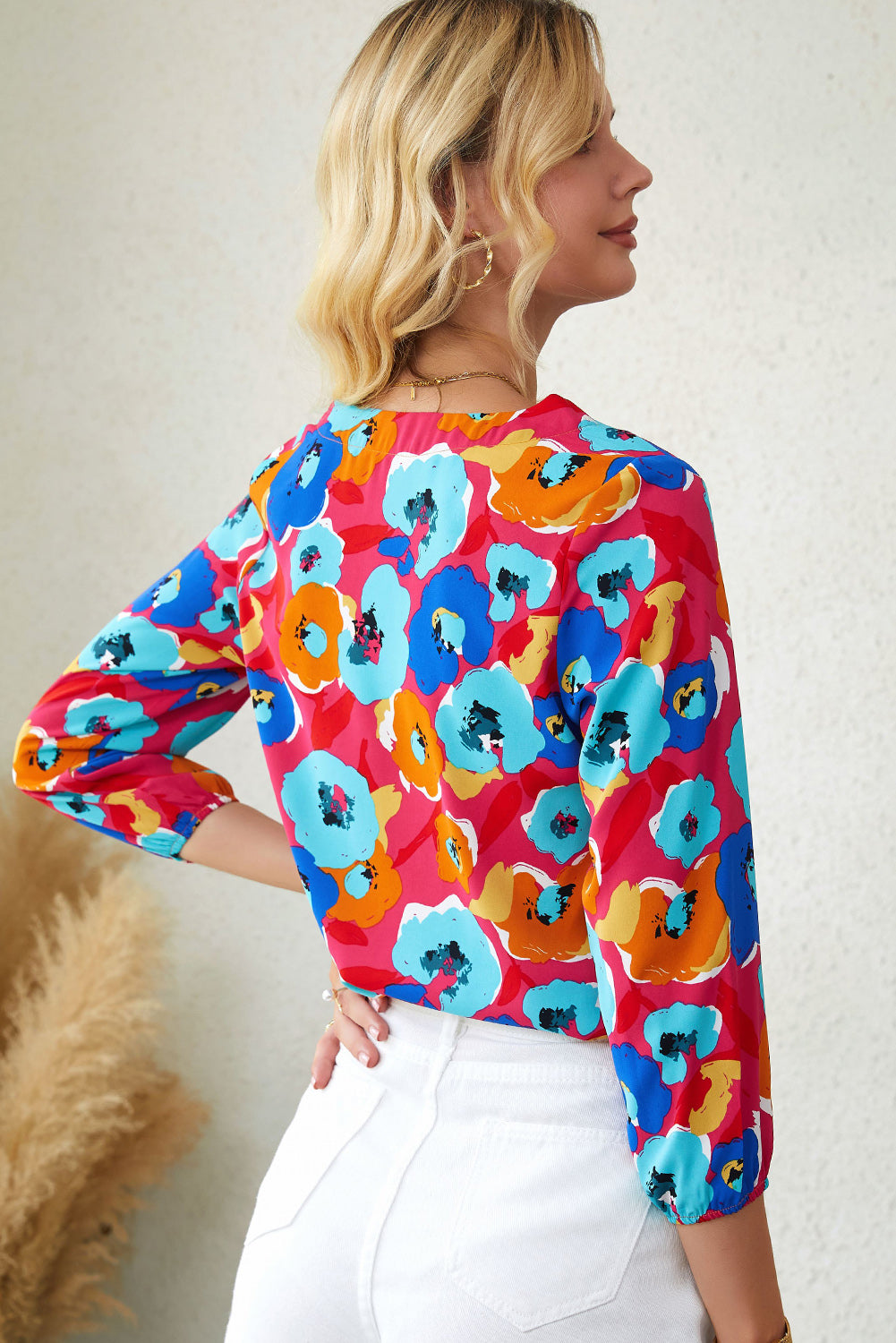 Roze veelkleurige blouse met V-hals en 3/4 mouwen met bloemenprint