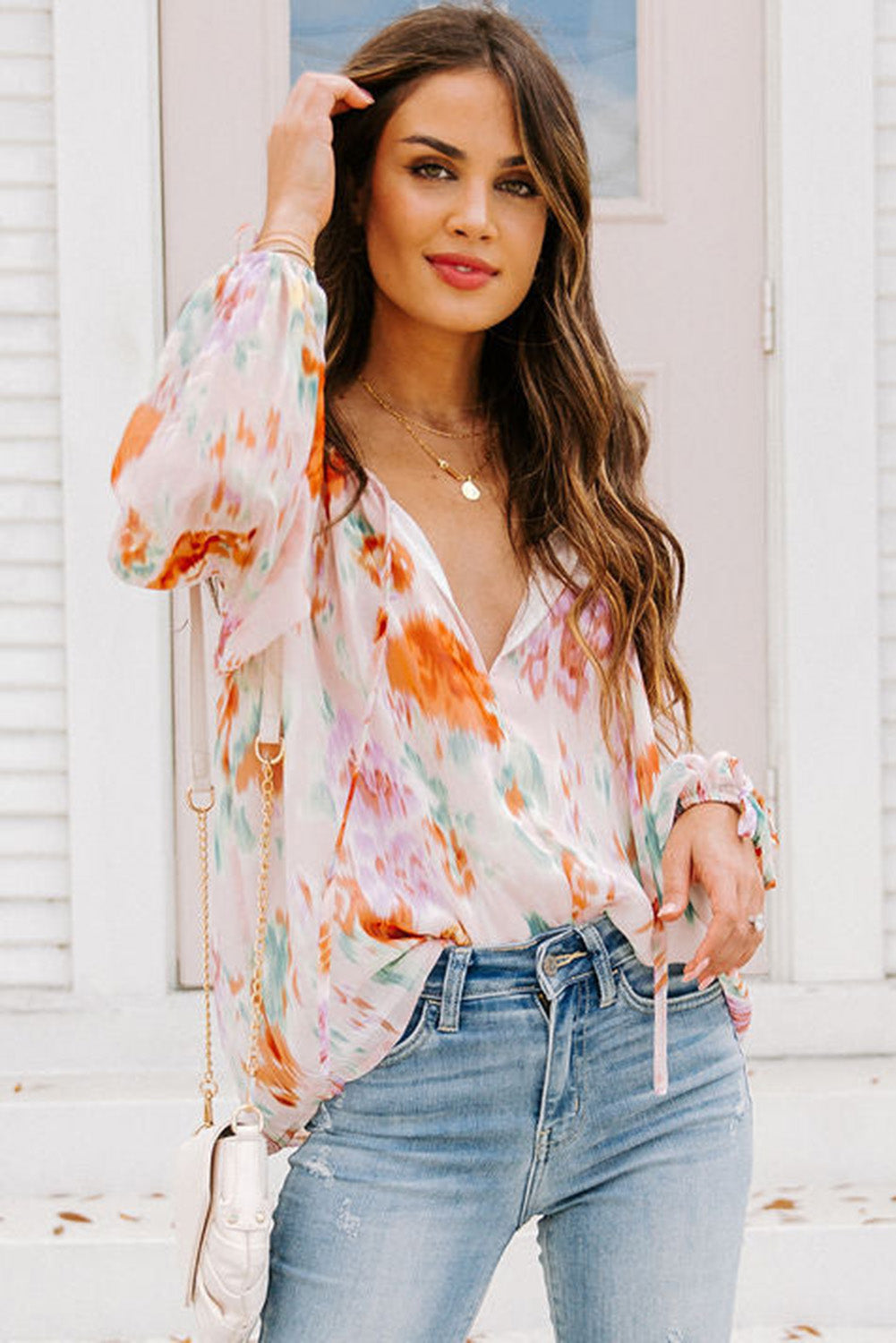Blouse met veelkleurige abstracte print en splithals en pofmouwen