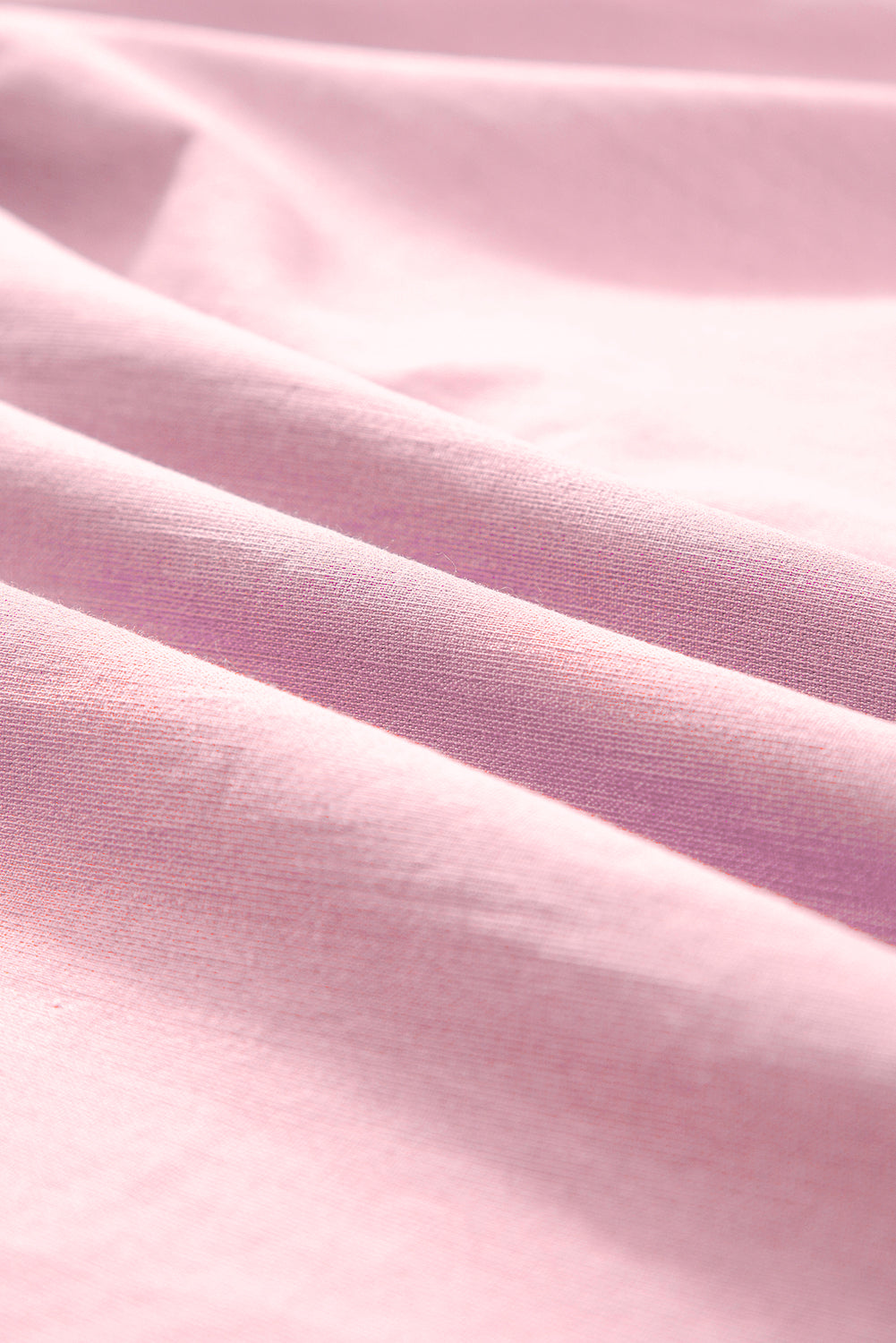 Roze bloemen geborduurde blouse met split aan de hals en pofmouwen