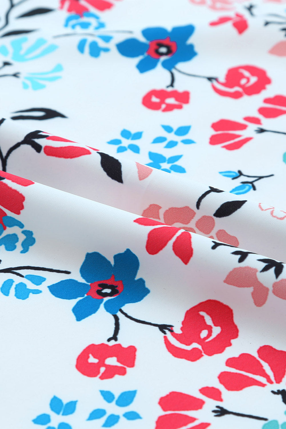 Veelkleurige kimono met lange mouwen en kwastjes