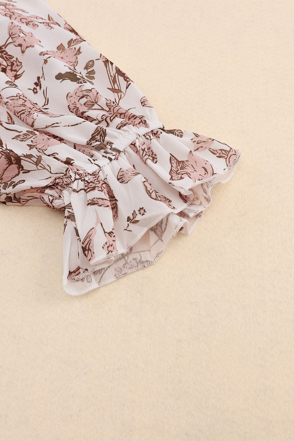 Boho bloemenprint blouse met split-V-hals en bubbelmouwen