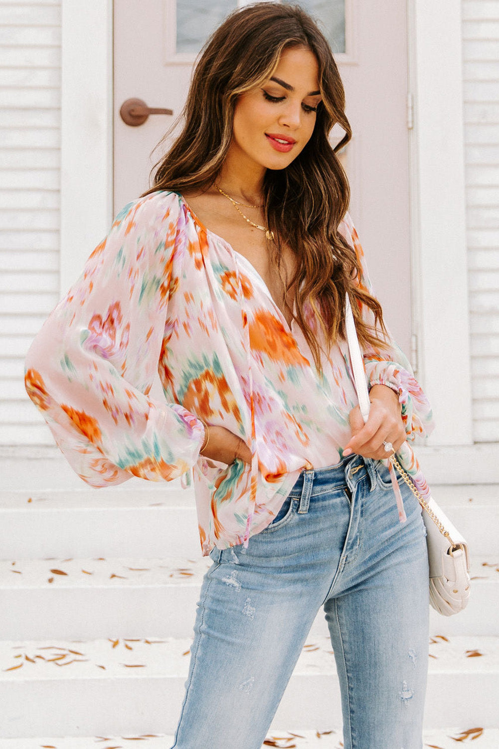 Blouse met veelkleurige abstracte print en splithals en pofmouwen