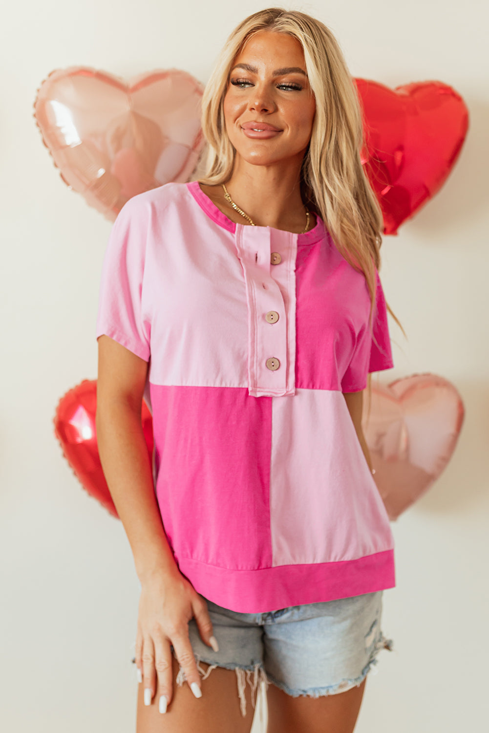 Roze tweekleurige halve knoppen Collared t -shirt