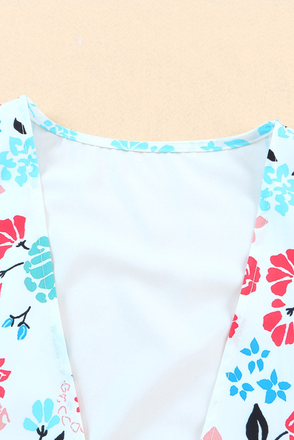 Veelkleurige kimono met lange mouwen en kwastjes
