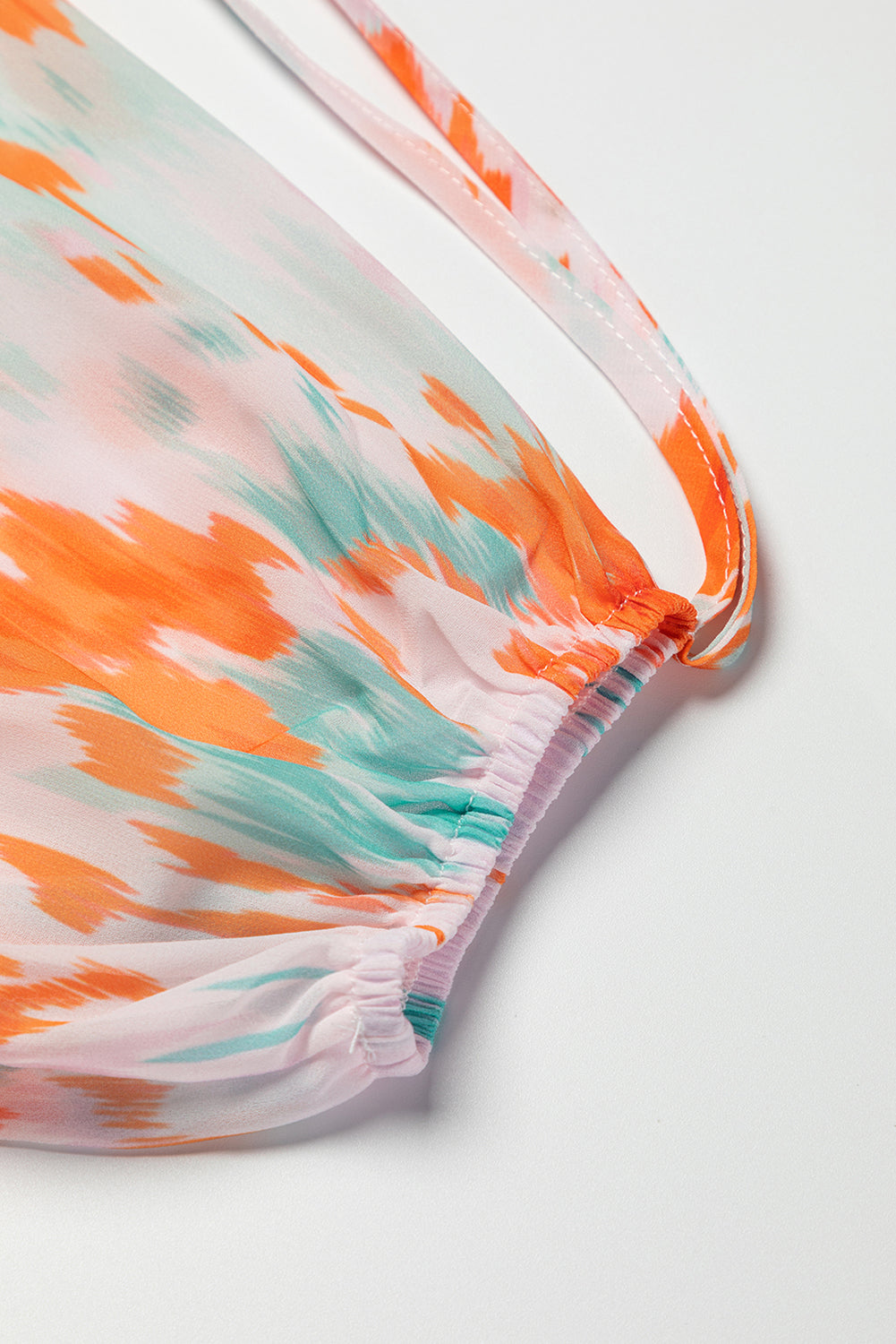 Blouse met veelkleurige abstracte print en splithals en pofmouwen