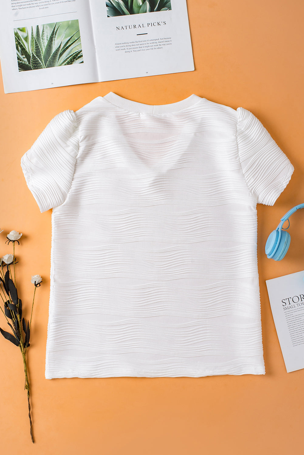 Witte effen kleur getextureerde top met V-hals en korte mouwen