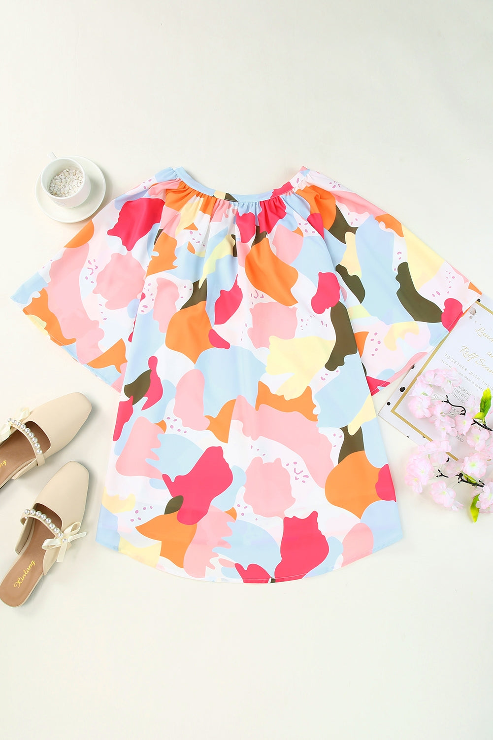 Blouse met veelkleurige bloemenprint, V-hals en halve mouw