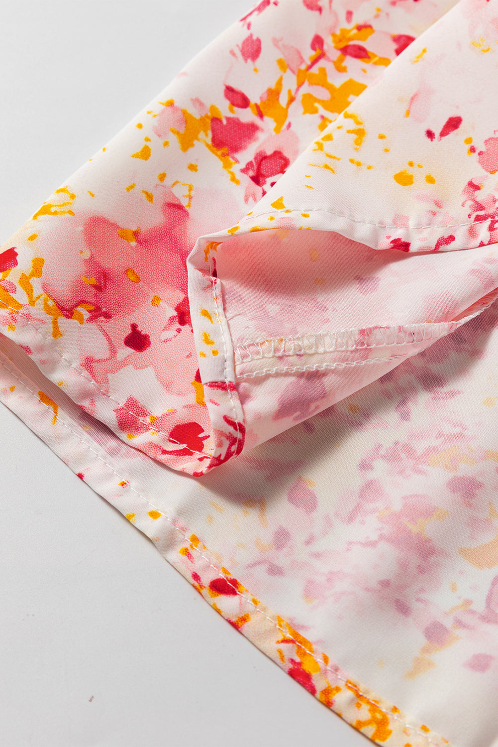 Roze, met bloemen bedrukte blouse met V-hals en bubbelmouwen