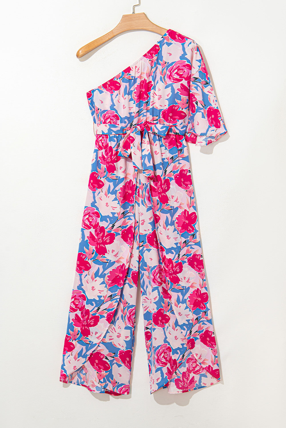 Roze bloemenprint asymmetrische halslijn enkele schouder drape mouw riem jumpsuit