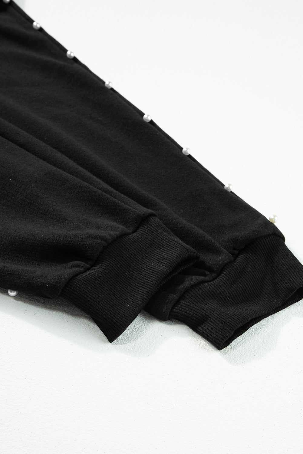 Set met zwarte kralendecor, trui en joggingbroek