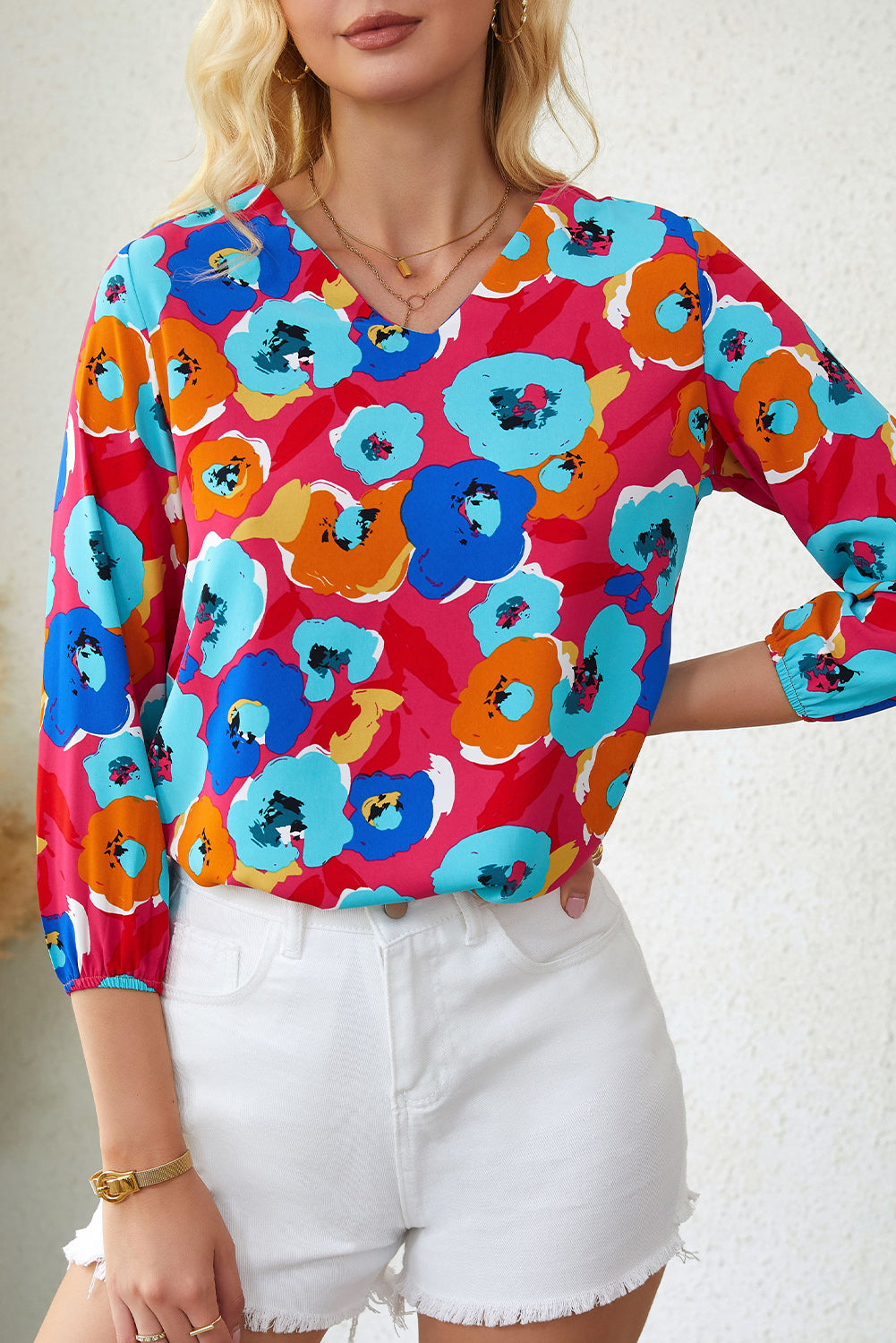Roze veelkleurige blouse met V-hals en 3/4 mouwen met bloemenprint