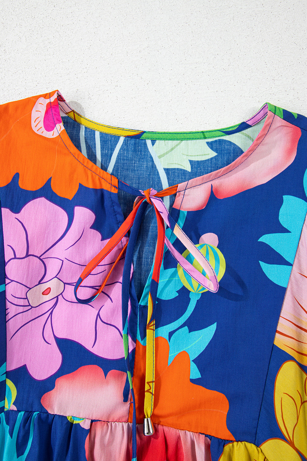 Donkerblauwe bloemenprint split nek babydoll jurk