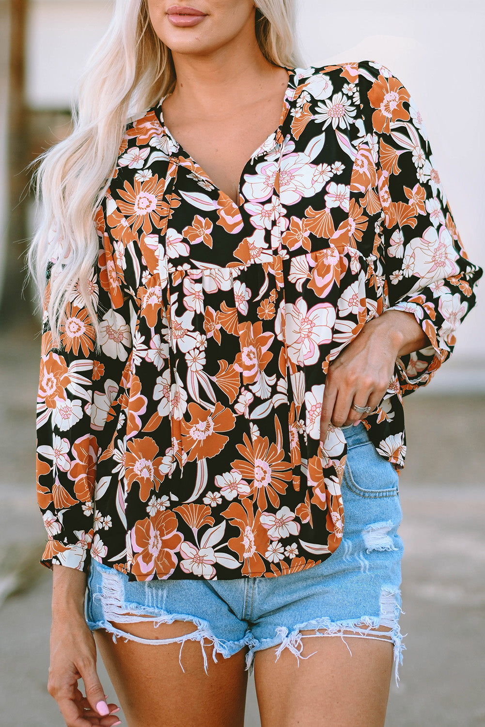 Bruine babydollblouse met 3/4 mouwen en bloemenprint
