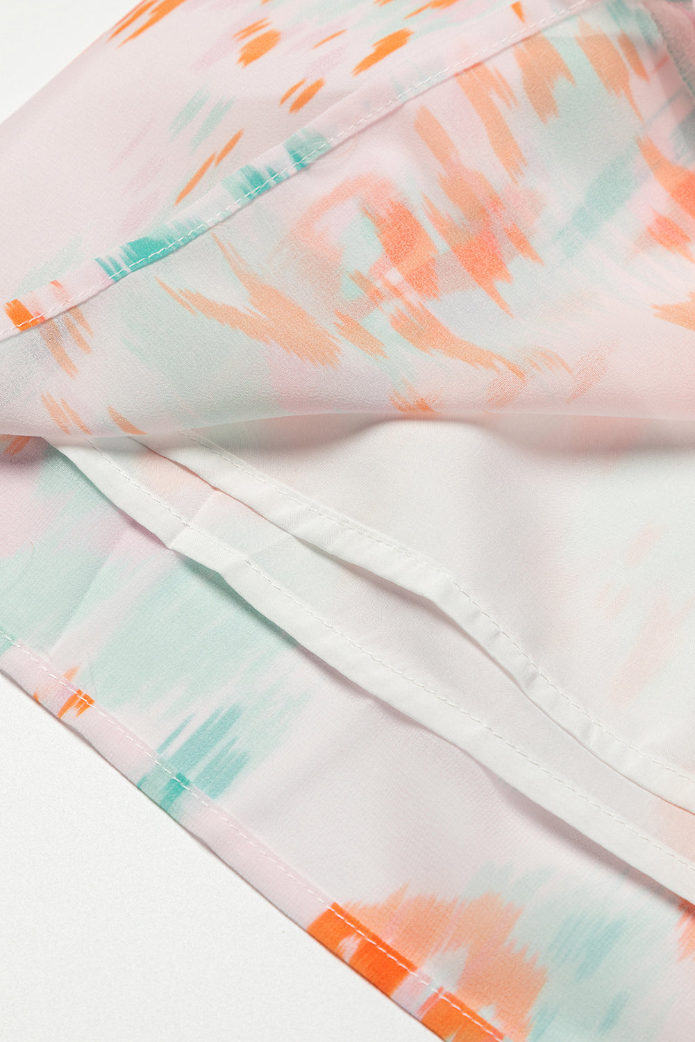 Blouse met veelkleurige abstracte print en splithals en pofmouwen