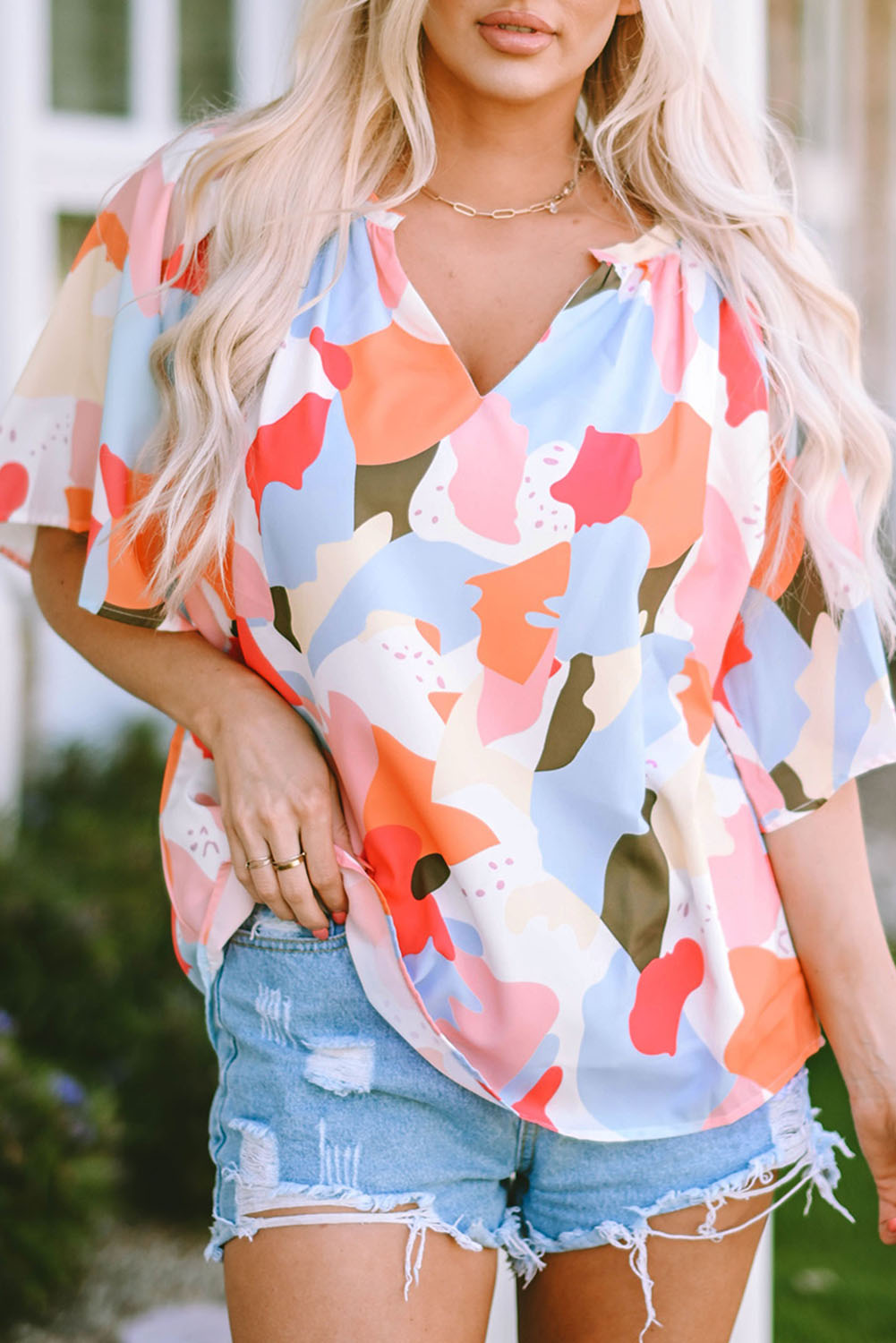Blouse met veelkleurige bloemenprint, V-hals en halve mouw