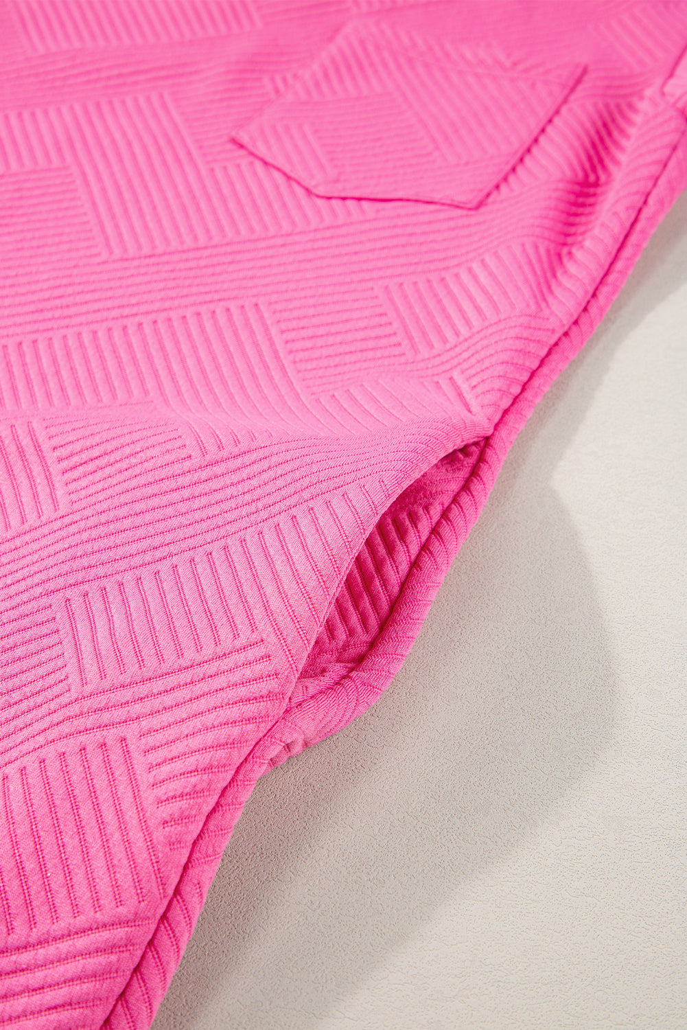 Sachet roze getextureerde T-shirtjurk met kapmouwen