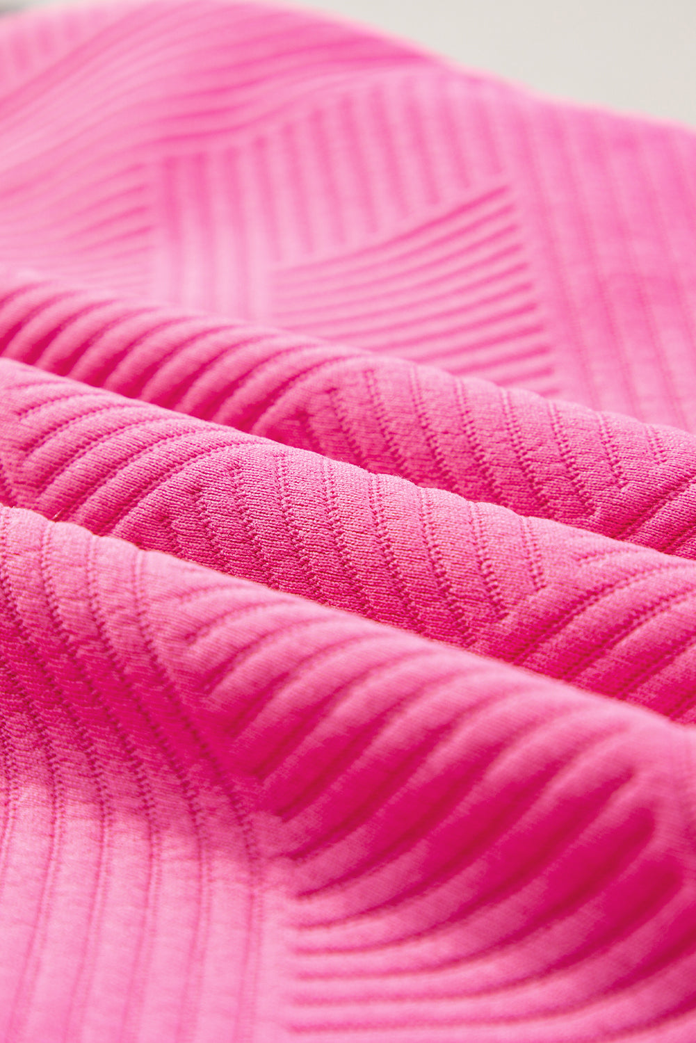 Sachet roze getextureerde T-shirtjurk met kapmouwen