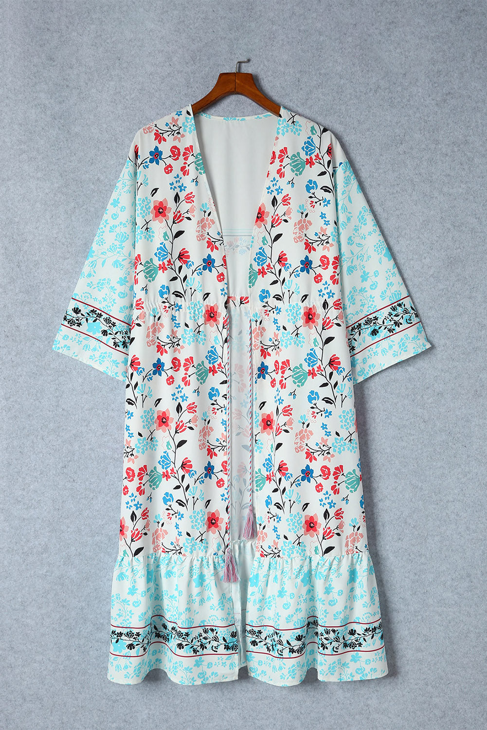 Veelkleurige kimono met lange mouwen en kwastjes