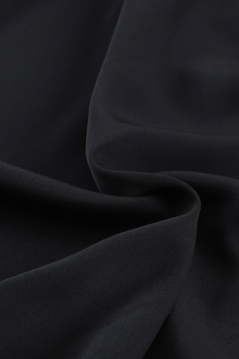 Zwart geknoopte asymmetrische off-shoulder blouse